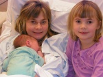 Katarina, with her daughter Alicia and her new-born son
